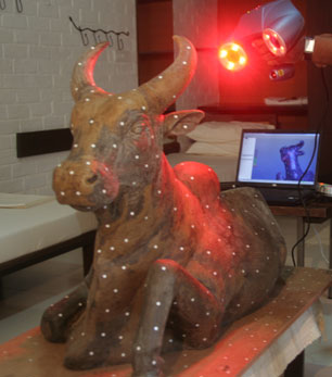 The birth of a 12-ft tall metal bull