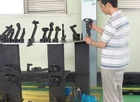 Tool testing and adjustment in the factory